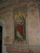 The Victorian painting of St Raphael in Holy Trinity Church sanctuary.