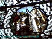 Small part of the St Thomas window giving a cameo depiction of Abraham preparing to slay Isaac.